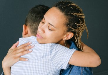 Mom and son hug in How to Nurture Self-Regulation in Children